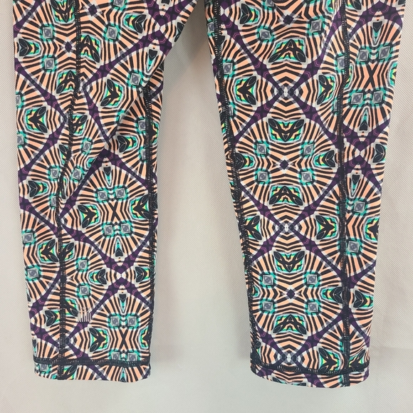 Victoria's Secret VSX Sport (XS) Knockout Crop Leggings Orange, Purple, Green - Picture 6 of 8